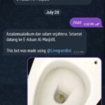 Tangkap layar interaksi bot Telegram E-Aduan Al-Masjidil.